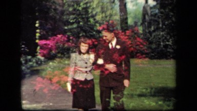 1941: Romantic Couple Strolling in New York Park