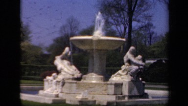 1941: the man was standing in park with waterfalls NEW YORK