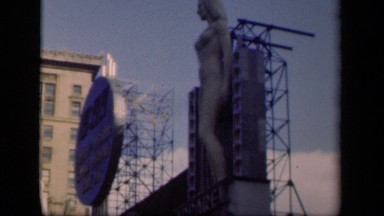 1941: white beautiful statue on roof of building NEW YORK