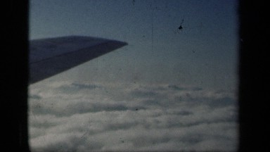 1941: flight is flying high in sky very slowly NEW YORK