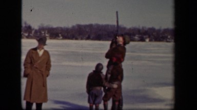 1942: the man have gun and looking in sky SEBRING OHIO