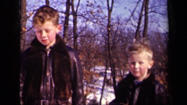 1942: small brother laughs loudly while taking photography SEBRING OHIO