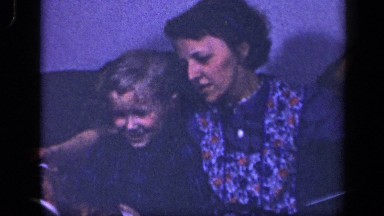 1942: child reading book with her mother and spending good time SEBRING OHIO