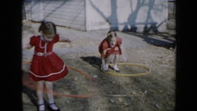 1958: the two children were playing, and dogs are walking MINNESOTA
