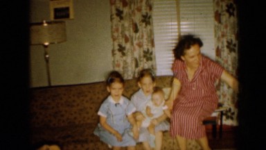 1958: mother kissing his son MINNESOTA