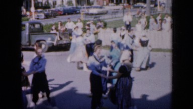 1959: people dancing in street IOWA