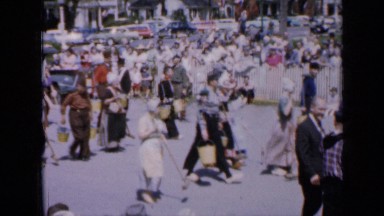 1959: the gang of people walking on road IOWA
