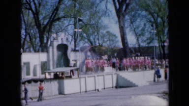 1959: large group of children onstage performing with jump rope IOWA