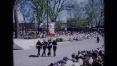 1959: american parade marching through city, people watching IOWA