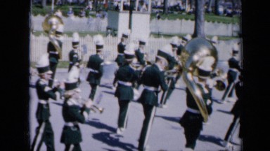 1959: hometown summer celebratory parade highlighting float and band IOWA