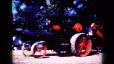 1959: the parade of ancient machines on countryside IOWA