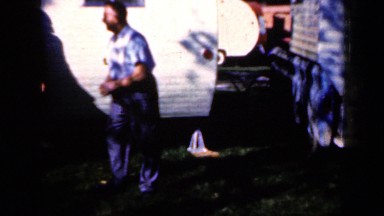 1959: men and women are happy to attend meeting near caravan IOWA