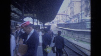 1962: slow moving train in station CANNES FRANCE