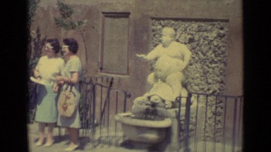 1962: the women were standing with statue FLORENCE ITALY