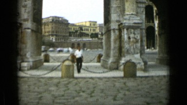 1962: Man Walking on Road Side in Rome, Italy