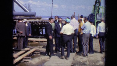 1971: group of men standing around on deck and talking to each other. MOSCOW