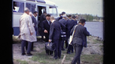1971: group of men about to get onto ferry. MOSCOW RUSSIA