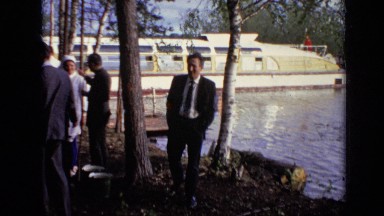1971: group of people gathering outside near lake. MOSCOW RUSSIA