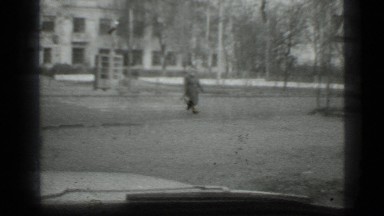 1975: woman crossing road without regard to oncoming vehicles RUSSIA