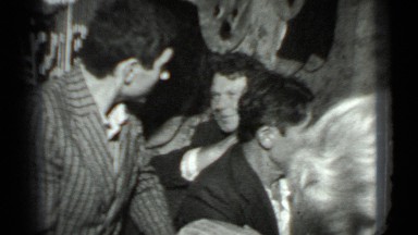 1975: group of men and women seated in discussion RUSSIA