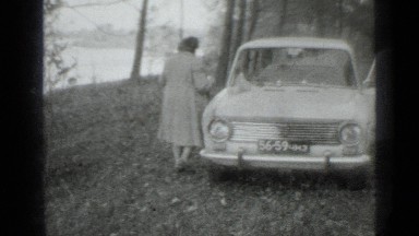 1975: lady open door of car and take knife from that for some purpose RUSSIA