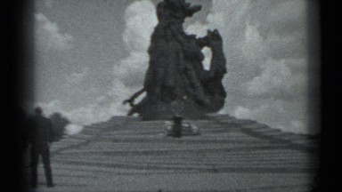 1983: people outdoors admiring what appears to be very large sculpture
