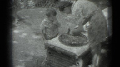 1983: woman giving food to child RUSSIA