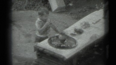 1983: child taking drink of water. RUSSIA
