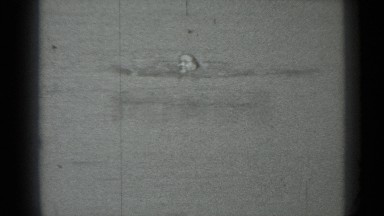 1983: lady swimming and boy playing at shore RUSSIA
