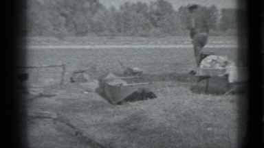 1983: men standing near roadside and cooking foods RUSSIA