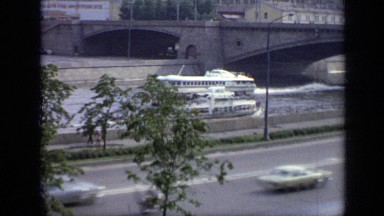 1971: the boat are going fast than bus moving in road MOSCOW RUSSIA