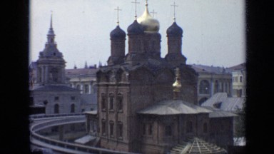1971: view of number of churches built centuries ago and standing amidst modern