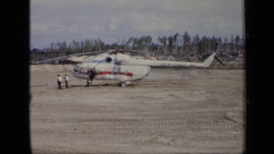 1971: group of people near helicopter talking and walking MOSCOW RUSSIA