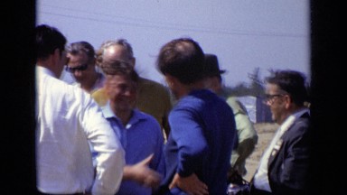 1971: two persons in group shaking their hands with friendly MOSCOW RUSSIA