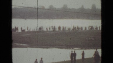 1967: people watching parachutes land in water. RUSSIA