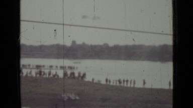 1967: lots of people are standing at corner of river RUSSIA