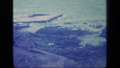 1970: waves hitting rocks. PUERTO RICO
