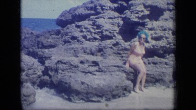 1970: lady enjoying swimsuit in seashore PUERTO RICO