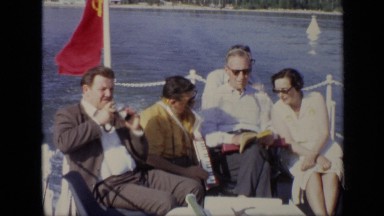 1971: the people were sitting in boat and taking photographs. MOSCOW RUSSIA