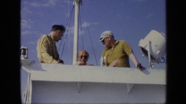 1971: three old gentlemen standing under white pole and talking MOSCOW RUSSIA