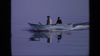 1971: two guys enjoying boating in lake MOSCOW RUSSIA