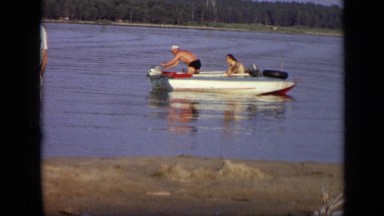 1971: man trying to start boat MOSCOW RUSSIA