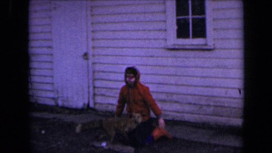 1964: girl child posing with statue of stuffed animal KANSAS