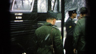 1963: few army soldiers are travelling by bus during winter season GERMANY