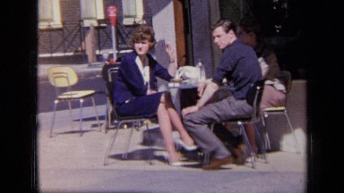 1963: man and woman, enjoying sun and each other's company LONDON ENGLAND