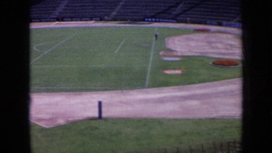 1963: panning shot of sports complex and field with surrounding stands. RUSSIA