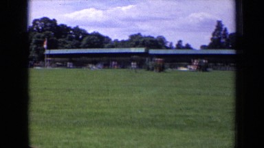 1963: dog is playing with his owner in happily and enjoyable ENGLAND
