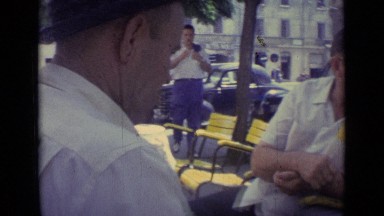 1962: gentlemen relaxing and enjoying glass of chilled beer in makeshift bar
