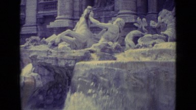 1962: water flowing through unique fountain, with people observing VATICAN CITY