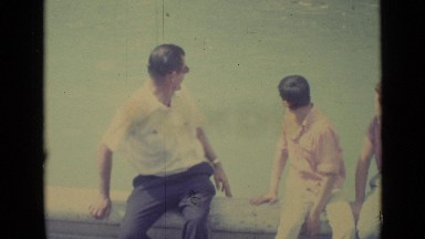 1962: some friends are sitting in short wall and talking something about